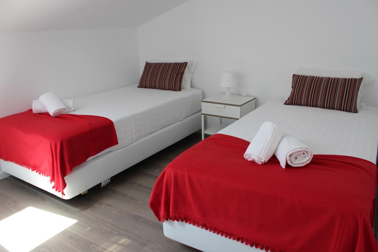 Cama Individual num Dormitório com 4 Camas